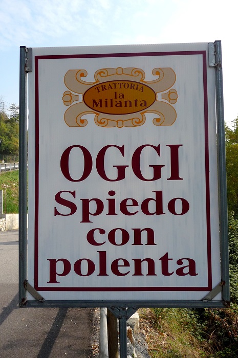 "Today spit roast with corn porridge" - the advertising of a restaurant is a possible reference to a songbird dish